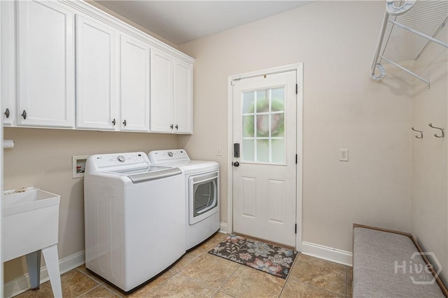 210 Windsong Dr, Richmond Hill, GA 31324 - laundry area featuring cabinet space and independent washer and dryer