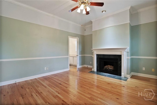 536 E Harris St, Savannah, GA 31401 - unfurnished living room with ceiling fan, wood finished floors, a fireplace, and ornamental molding