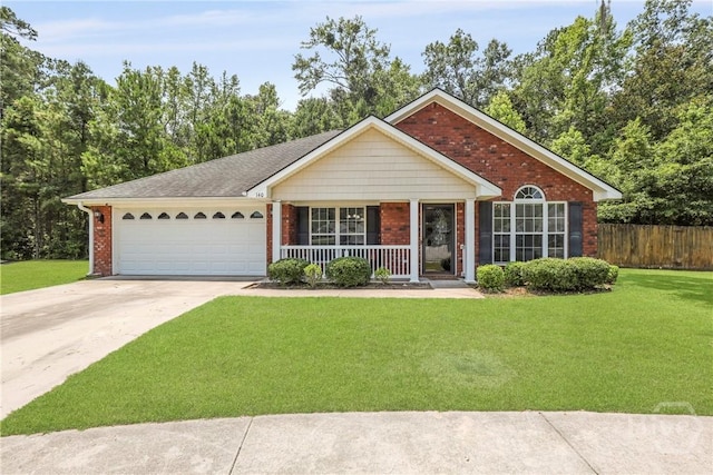 140 Kettle Creek Ln, Midway, GA 31320 - ranch-style home with covered porch, brick siding, an attached garage, and concrete driveway