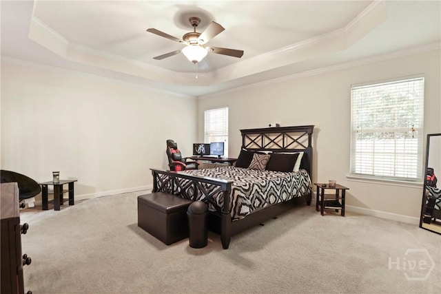 140 Kettle Creek Ln, Midway, GA 31320 - carpeted bedroom with a tray ceiling, ornamental molding, multiple windows, and a ceiling fan
