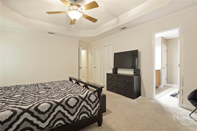 140 Kettle Creek Ln, Midway, GA 31320 - carpeted bedroom featuring a tray ceiling, ornamental molding, and ceiling fan