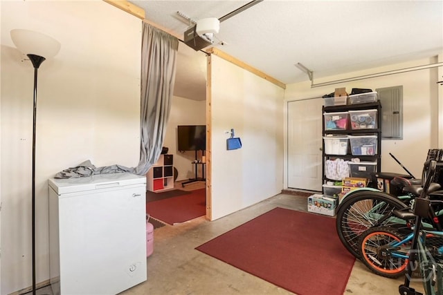 140 Kettle Creek Ln, Midway, GA 31320 - garage with fridge and electric panel
