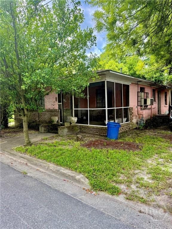 1213 Graydon St, Savannah, GA 31404 - view of front of house with a sunroom