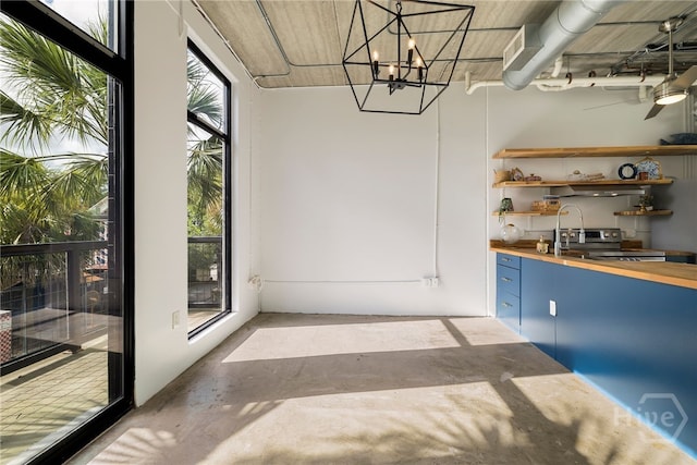 2406 De Soto Ave Unit B, Savannah, GA 31401 - unfurnished dining area with concrete flooring and a sink