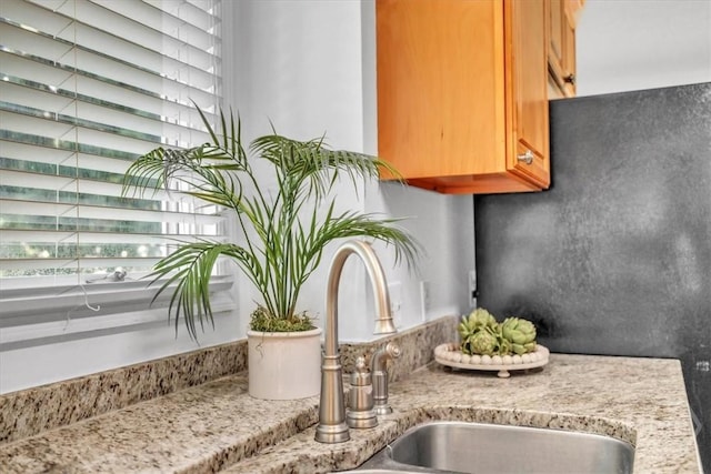 3005 River Dr Unit 302, Savannah, GA 31404 - detailed view of a sink and light stone countertops