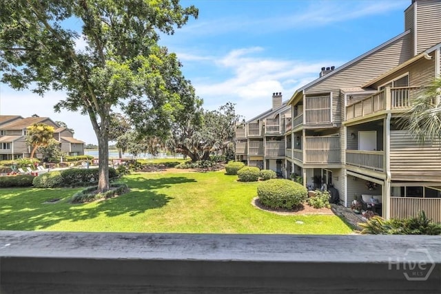 3005 River Dr Unit 302, Savannah, GA 31404 - view of property's community with a yard