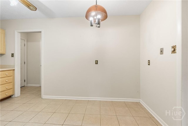 2 N Stillwood Ct, Savannah, GA 31419 - unfurnished dining area featuring baseboards and light tile patterned flooring