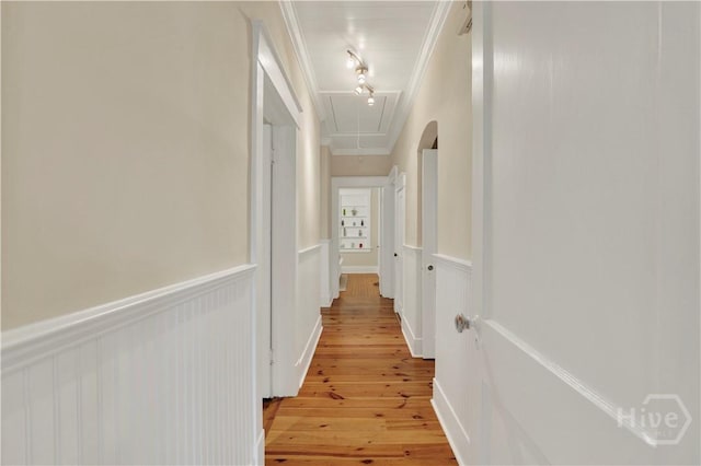 1507 E 49th St, Savannah, GA 31404 - hall with attic access, crown molding, a wainscoted wall, light wood-style flooring, and a decorative wall