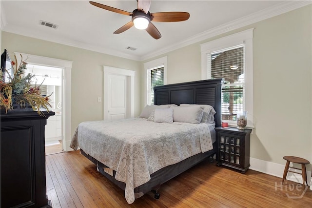 1507 E 49th St, Savannah, GA 31404 - bedroom with hardwood / wood-style floors, multiple windows, ornamental molding, and ceiling fan