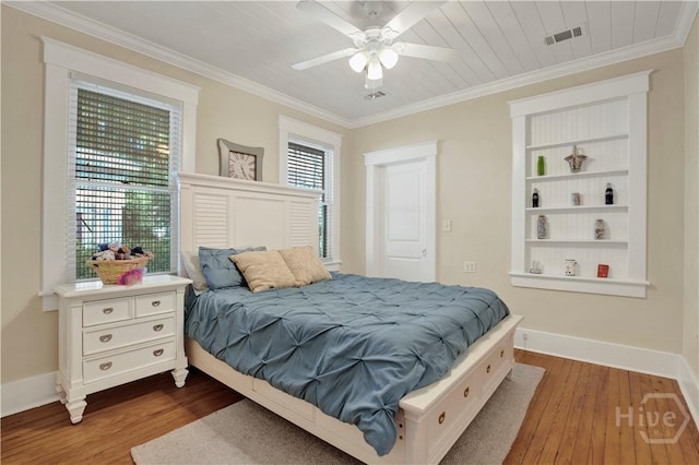 1507 E 49th St, Savannah, GA 31404 - bedroom with dark wood-style flooring, crown molding, and ceiling fan
