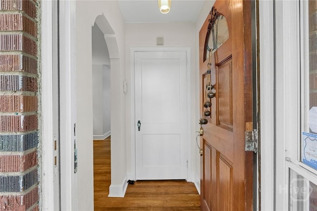 1424 E 53rd St, Savannah, GA 31404 - foyer featuring wood finished floors and arched walkways
