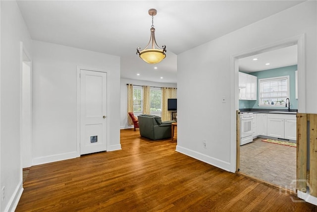 1424 E 53rd St, Savannah, GA 31404 - hallway with wood finished floors and recessed lighting