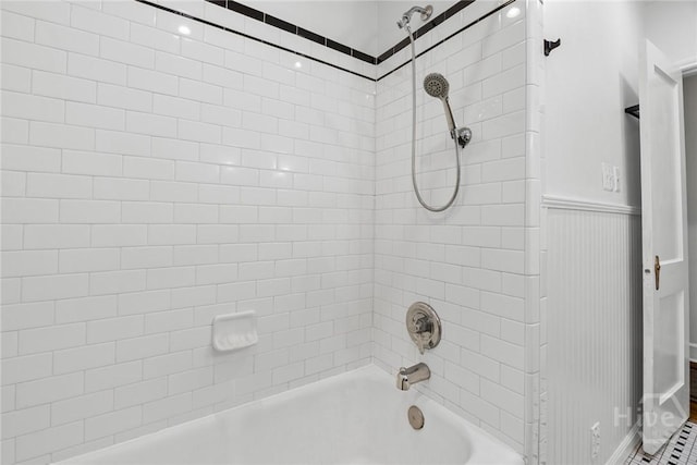 1424 E 53rd St, Savannah, GA 31404 - full bath with bathtub / shower combination and a wainscoted wall