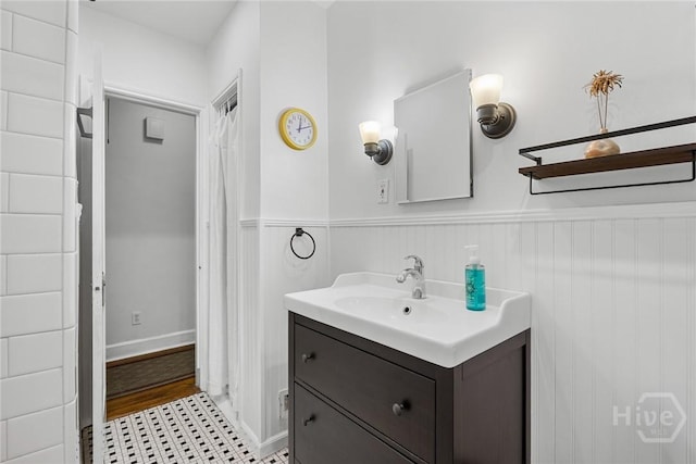 1424 E 53rd St, Savannah, GA 31404 - bathroom with vanity and wainscoting