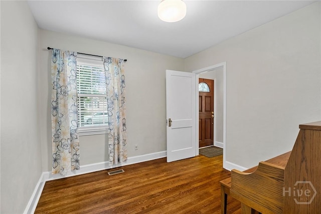1424 E 53rd St, Savannah, GA 31404 - empty room featuring baseboards and wood finished floors