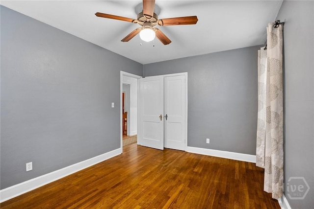 1424 E 53rd St, Savannah, GA 31404 - unfurnished bedroom with wood finished floors and a ceiling fan