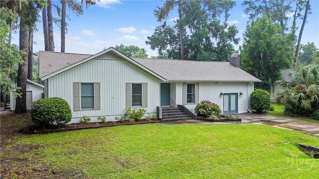 27 Bryan Wood Cir, Savannah, GA 31410 - single story home with a chimney, a shingled roof, and a front yard
