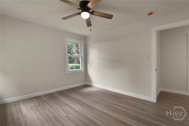 114 Paradise Dr, Savannah, GA 31406 - empty room featuring wood finished floors and a ceiling fan