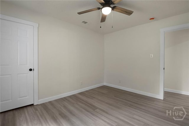 114 Paradise Dr, Savannah, GA 31406 - unfurnished bedroom featuring wood finished floors and a ceiling fan