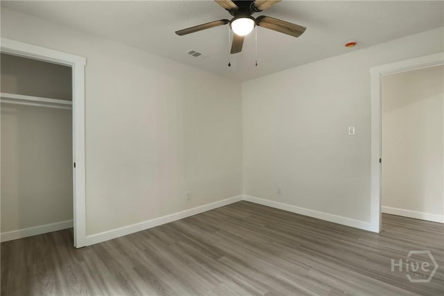 114 Paradise Dr, Savannah, GA 31406 - unfurnished bedroom featuring wood finished floors, a closet, and ceiling fan