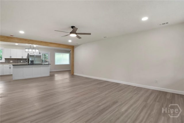 114 Paradise Dr, Savannah, GA 31406 - unfurnished living room featuring recessed lighting, light wood-style flooring, and a ceiling fan