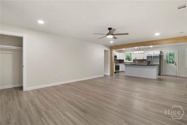 114 Paradise Dr, Savannah, GA 31406 - unfurnished living room featuring ceiling fan, recessed lighting, and light wood-type flooring