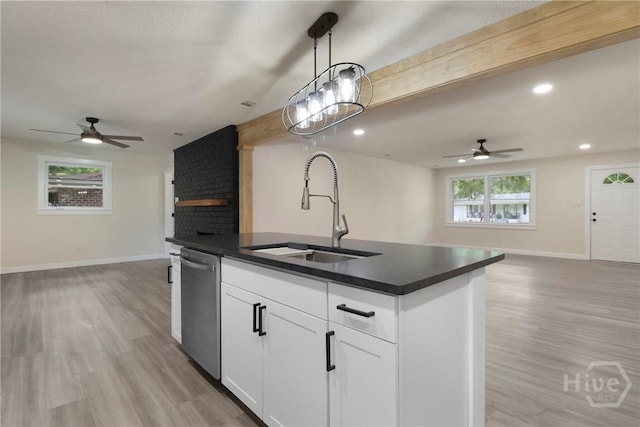 114 Paradise Dr, Savannah, GA 31406 - kitchen with a ceiling fan, open floor plan, stainless steel dishwasher, beam ceiling, and recessed lighting