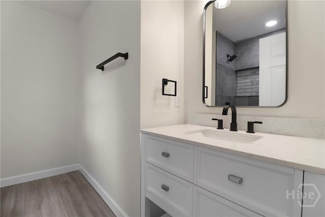 114 Paradise Dr, Savannah, GA 31406 - bathroom featuring vanity, wood finished floors, and a shower