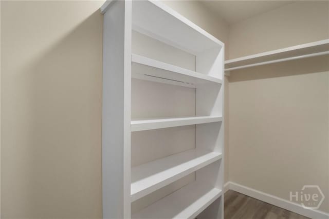 114 Paradise Dr, Savannah, GA 31406 - spacious closet featuring dark wood finished floors