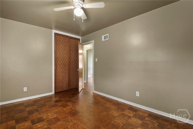 5012 Spartan Dr, Savannah, GA 31404 - spare room with baseboards and ceiling fan