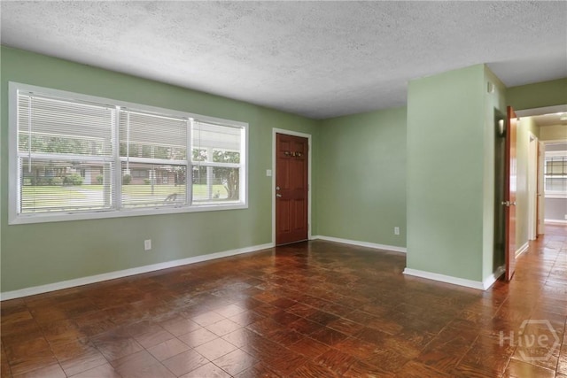 5012 Spartan Dr, Savannah, GA 31404 - empty room featuring a textured ceiling
