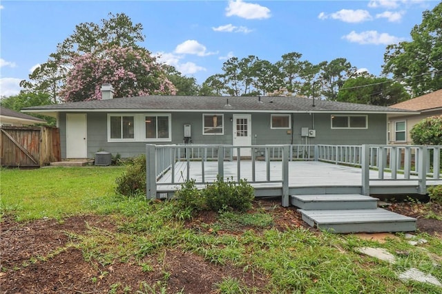 5012 Spartan Dr, Savannah, GA 31404 - rear view of property featuring a chimney and a deck