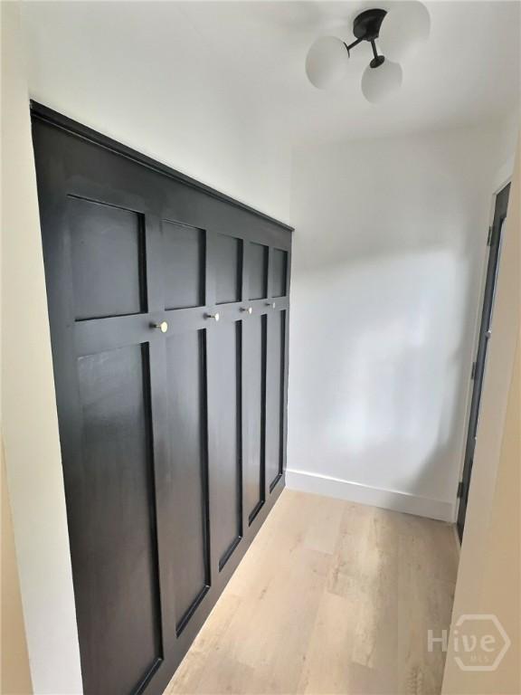13004 Canterbury Rd, Savannah, GA 31419 - mudroom with light wood-style floors and baseboards