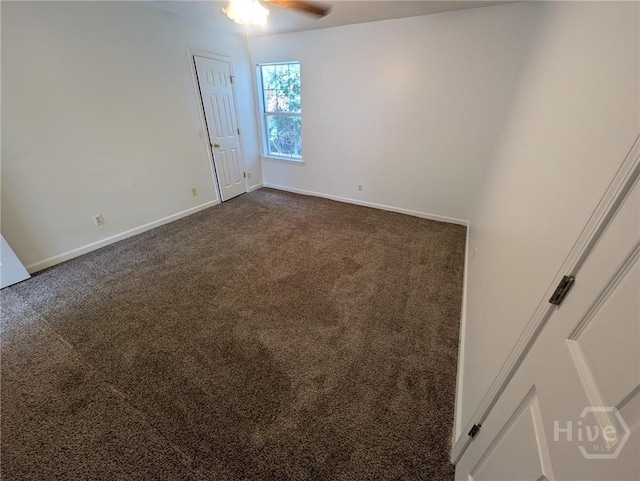 47 Rose Hill Dr, Savannah, GA 31419 - spare room featuring a ceiling fan and dark carpet