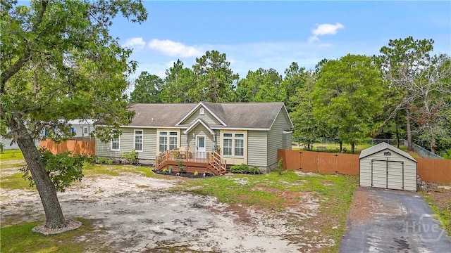 586 Church Cir, Jesup, GA 31545 - view of front of property with a storage unit and a deck