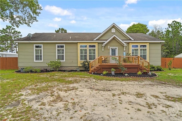 586 Church Cir, Jesup, GA 31545 - back of property with a wooden deck