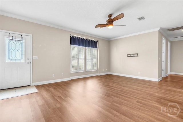 586 Church Cir, Jesup, GA 31545 - entrance foyer featuring ceiling fan, wood finished floors, and crown molding