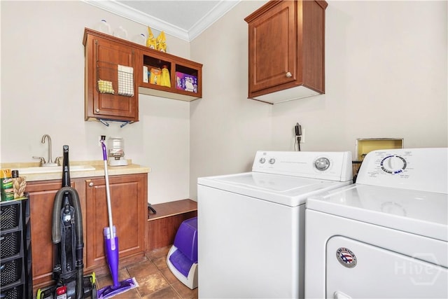 586 Church Cir, Jesup, GA 31545 - washroom with washing machine and clothes dryer, cabinet space, crown molding, and tile patterned floors