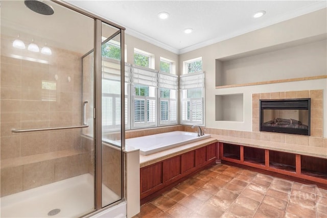 586 Church Cir, Jesup, GA 31545 - full bath featuring a shower stall, crown molding, a garden tub, a fireplace, and recessed lighting