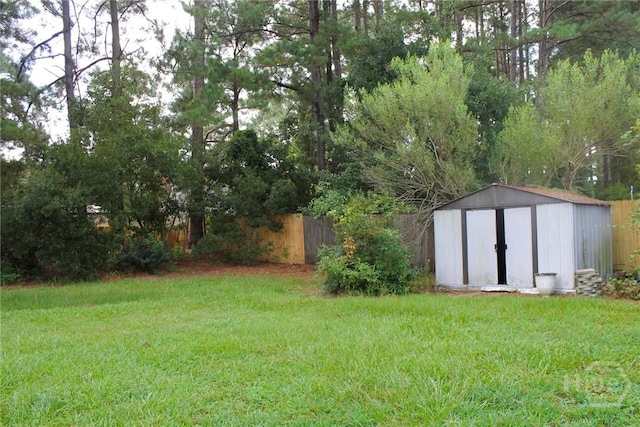 131 Brigham Dr, Richmond Hill, GA 31324 - view of yard featuring a shed
