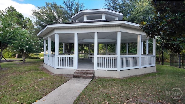 131 Brigham Dr, Richmond Hill, GA 31324 - view of front facade featuring a front yard and a gazebo