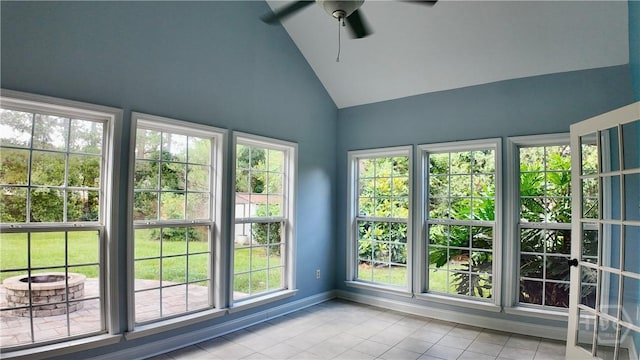 131 Brigham Dr, Richmond Hill, GA 31324 - unfurnished sunroom with tile patterned flooring, healthy amount of natural light, and high vaulted ceiling