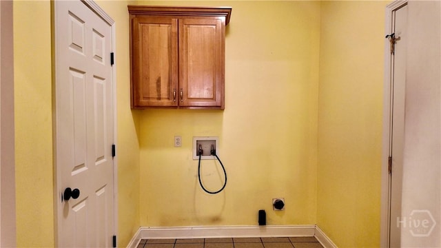131 Brigham Dr, Richmond Hill, GA 31324 - washroom with hookup for a washing machine, electric dryer hookup, tile patterned floors, and cabinet space