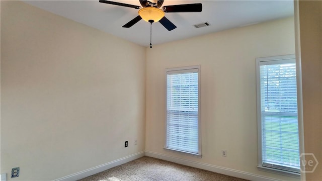 131 Brigham Dr, Richmond Hill, GA 31324 - empty room featuring light carpet and a ceiling fan
