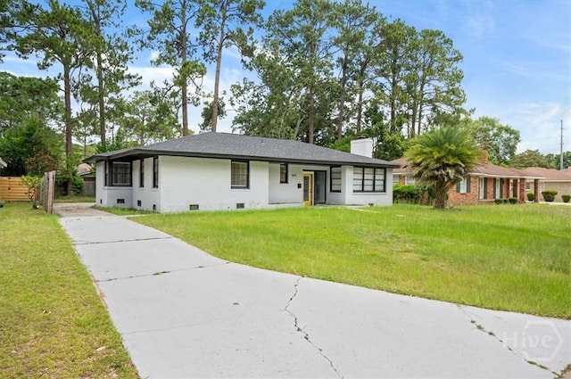 4611 Cumberland Dr, Savannah, GA 31405 - view of front of house with driveway, crawl space, a front yard, and a chimney