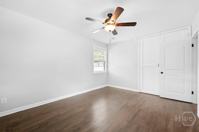 4611 Cumberland Dr, Savannah, GA 31405 - unfurnished bedroom with dark wood-style floors, a closet, and a ceiling fan