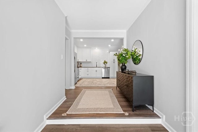 4611 Cumberland Dr, Savannah, GA 31405 - hallway with crown molding, wood finished floors, and recessed lighting