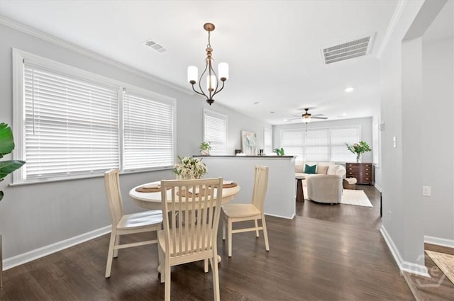 4611 Cumberland Dr, Savannah, GA 31405 - dining area with plenty of natural light, wood finished floors, a ceiling fan, recessed lighting, and ornamental molding