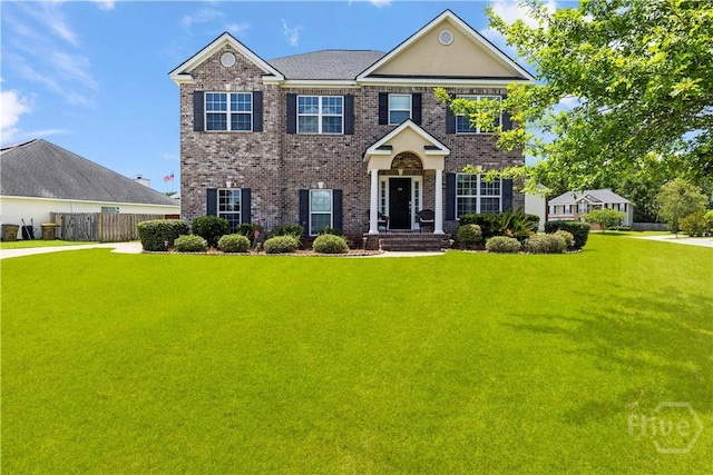 219 Byron Dr, Richmond Hill, GA 31324 - view of front facade with brick siding