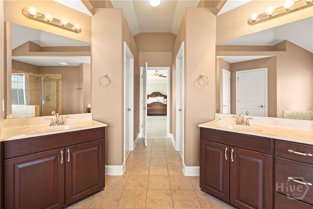 219 Byron Dr, Richmond Hill, GA 31324 - full bath with a stall shower, two vanities, and tile patterned flooring